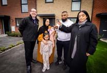 FCHO CEO Mark Gifford With OMB Council Leader Arooj Shah Handing Keys To Mr Ahmed And His Family 2