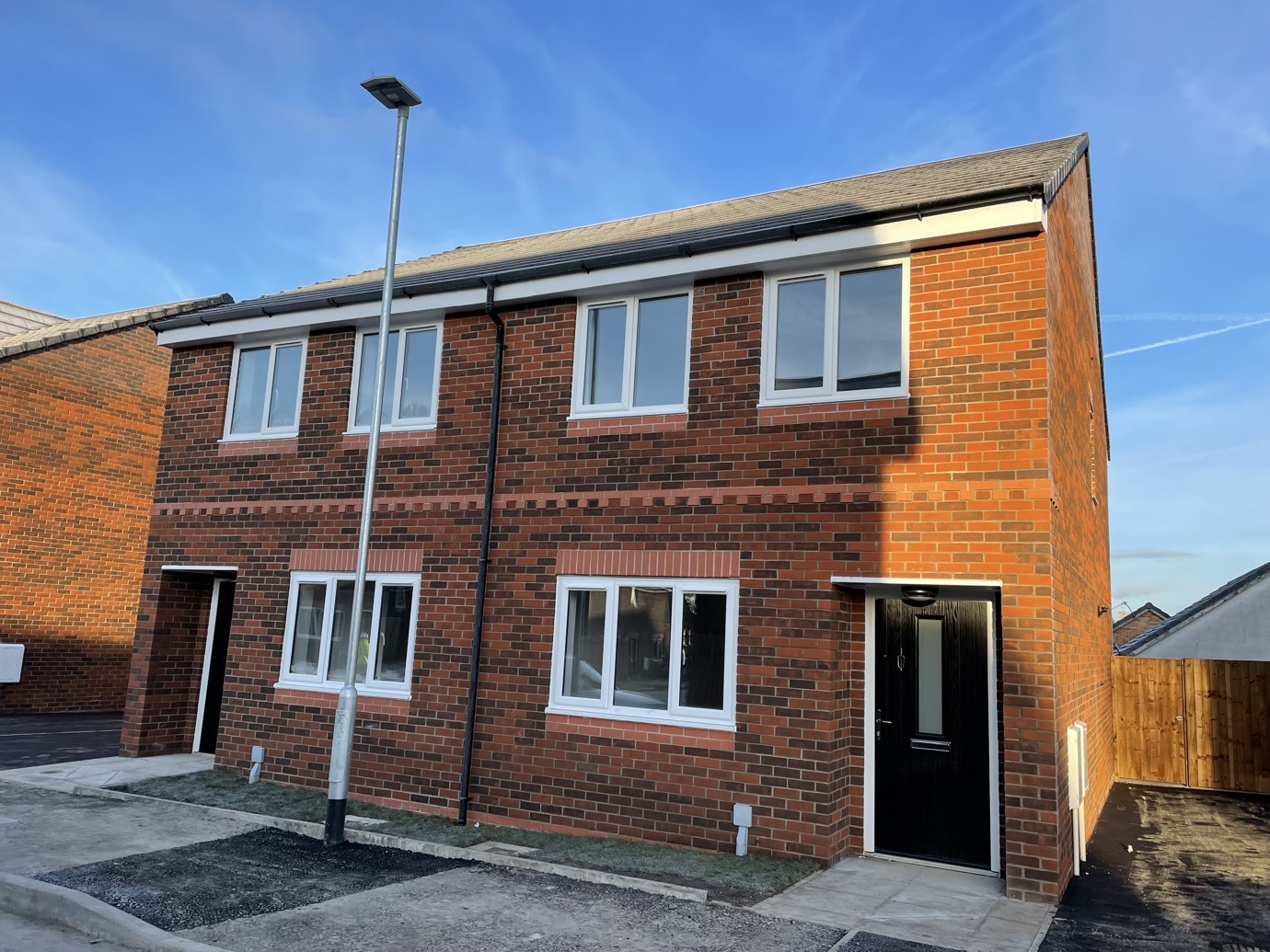 Tanners Fold development of 24 three-bedroom family houses for affordable rent