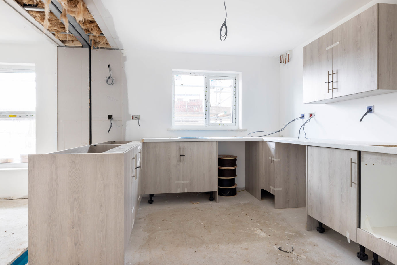 The modular system is fitted with timber studwork internal walls, pre-fitted insulation and plasterboard, plumbing, electrics and kitchens, floors and doors before they are delivered to site and craned into place.